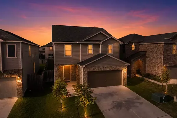 Sunset exterior of 13212 Dolley Madison St in Manor, Texas